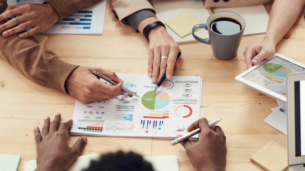 Business team planning digital marketing strategy with SEO, content, and social media.